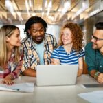 Successful company with happy employees in modern office