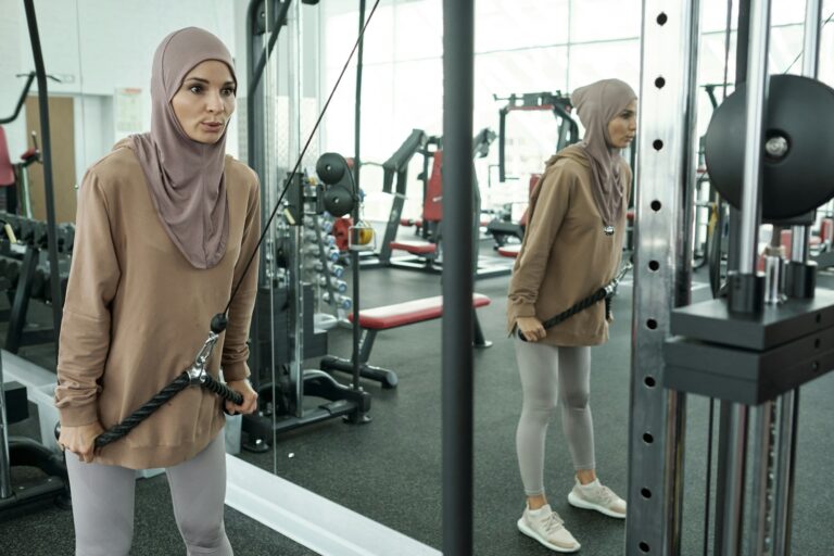 Muslim Woman Exercising In Gym